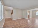 Open floor plan featuring a spacious living room with access to the kitchen at 7024 Beaverwood Dr, Raleigh, NC 27616