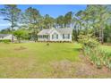 Quaint single-story home with a well-manicured lawn and inviting curb appeal at 110 Phyllis Dr, Benson, NC 27504