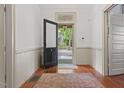 Welcoming foyer featuring hardwood floors and an open doorway at 304 Linden Ave, Raleigh, NC 27601