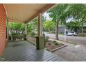 Inviting front porch with a swing, offering a relaxing outdoor space at 304 Linden Ave, Raleigh, NC 27601