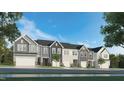 New townhomes showing a variety of exterior colors and architectural styles in a vibrant community setting at 339 Thompson Overlook Way # 237, Smithfield, NC 27577