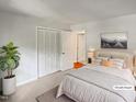 Relaxing bedroom with natural light, a queen-size bed, and ample closet space at 1104 Theresa Ct, Raleigh, NC 27615