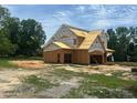New construction home showing the framing, roofing and underlayment on the exterior of this two-story home at 209 Atkins Rd, Cameron, NC 28326