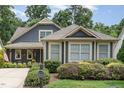 Charming home featuring well-maintained landscaping and inviting curb appeal at 241 Serenity Hill Circle Cir, Chapel Hill, NC 27516