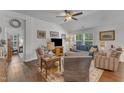 Comfortable living room area with vaulted ceilings, natural light, and neutral color palette at 2634 Yellow Pine Rd, Raleigh, NC 27616