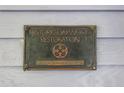 Historic Oakwood Restoration plaque indicating the J.W. Marcom House built in 1901 at 517 N East St, Raleigh, NC 27604
