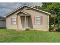 Charming single-story home featuring a cozy front porch and traditional siding at 1416 Betz St, Rocky Mount, NC 27803