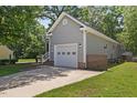 Rear exterior showcasing the home's architectural style and well-kept surroundings at 1801 Sagamore Ct, Raleigh, NC 27604