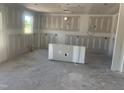 Unfinished two-car garage awaiting conversion with windows and smooth concrete flooring at 245 Tidal Pool Way, Cary, NC 27519