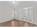 Bright office featuring hardwood floors, french doors, and natural light at 1112 Monterey Bay Dr, Wake Forest, NC 27587