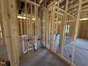 Bathroom under construction shows the framing and plumbing before the walls are up at 136 Tuskeegee Dr, Smithfield, NC 27577