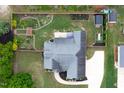 Overhead view of a home featuring a fenced backyard and a long paved driveway at 182 Brendamoore Ct, Fuquay Varina, NC 27526