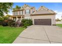 Traditional two-story home with attached two car garage and mature landscaping at 234 Lars Ln, Garner, NC 27529