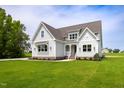 Attractive two-story home features a well-kept lawn and welcoming front entrance at 2617 Packhouse Rd, Zebulon, NC 27597