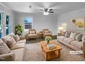 Bright living room featuring hardwood floors, neutral walls, and modern furnishings at 600 Cecil St, Durham, NC 27707