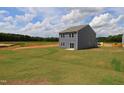 Expansive backyard with lush green grass, perfect for outdoor activities and entertaining at 970 Bombardier Aly, Spring Hope, NC 27882