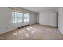 Bright bedroom with carpet flooring and natural light at 1109 N Pinkston St. St, Henderson, NC 27536
