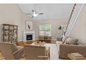Bright living room with hardwood floors, vaulted ceiling, fireplace, and neutral decor for relaxation at 240 Paddy Ln, Youngsville, NC 27596