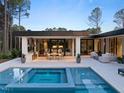 Beautiful backyard pool and outdoor living space perfect for relaxation and entertainment at 812 Stradella Rd, Raleigh, NC 27614