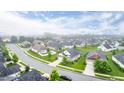 An aerial view of a charming neighborhood featuring tree-lined streets and well-maintained homes at 1096 Aberlour Ln, Burlington, NC 27215