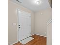 Inviting foyer with hardwood floors and neutral walls, providing a welcoming entrance to the home at 118 Brandi Dr, Rolesville, NC 27571