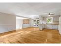 Bright living room featuring hardwood floors and white trim for an inviting atmosphere at 3329 Broughton Dr, Durham, NC 27704