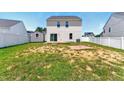 Spacious backyard featuring a shed and a white picket fence, great for outdoor enjoyment at 350 Pillow Ln, Burlington, NC 27217