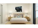 Inviting bedroom with soft lighting, a large bed, and stylish decor for a relaxing ambiance at 40 Regal Gardens Ct, Angier, NC 27501
