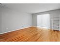 Spacious living room featuring hardwood floors and a sliding glass door at 4705 Walden Pond Dr # 110-C, Raleigh, NC 27604