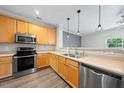 Well-equipped kitchen featuring stainless steel appliances and ample counter space at 1003 Crimson Dr, Durham, NC 27713