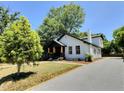 Side view of the house with the driveway at 114 N Guthrie Ave, Durham, NC 27703