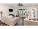 Inviting living room with hardwood floors, comfortable seating, and a bright, airy atmosphere at 34 Tanglewood Pl, Angier, NC 27501