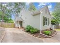 Charming home featuring a well-maintained yard and side yard at 6004 Volant Dr, Raleigh, NC 27609