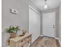 Inviting entryway with closet, decorative accents and rug at 501 Gooseneck Dr # B2, Cary, NC 27513