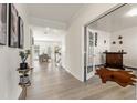 Bright foyer showcasing beautiful hardwood floors, an open floor plan, and natural light at 1165 Sun Spgs Rd, Wake Forest, NC 27587