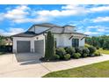 Beautiful home featuring an attached two-car garage and meticulously maintained landscaping at 2004 Yamacraw Dr, Knightdale, NC 27545