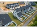 An aerial shot showcases this townhome's backyard, set within a well-planned community with inviting green spaces at 228 Shingle Oak Rd, Wake Forest, NC 27587