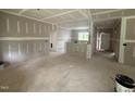 Under-construction interior view of a living space showing drywall and the entrance to the home at 2776 Rains Mill Rd, Princeton, NC 27569
