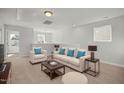 Comfortable living area with plush seating and neutral decor at 293 Gregory Village Dr, Lillington, NC 27546