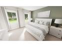 Serene main bedroom with neutral walls, white trim, large windows, and carpeted floors at 338 Beacon Dr, Pittsboro, NC 27312