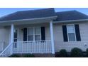 Charming single-story home showcasing a welcoming front porch and classic curb appeal at 2001 Ballston Pl, Knightdale, NC 27545