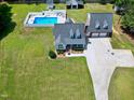 Expansive aerial view of property with swimming pool and outdoor amenities at 2709 Les Paul Ln, Apex, NC 27539