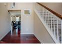 Entryway featuring hardwood floors and staircase at 413 Barnard Castle Ct, Rolesville, NC 27571