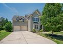 Spacious home with a two-car garage and a long driveway at 413 Barnard Castle Ct, Rolesville, NC 27571