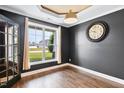 Office space with a view of the yard and a stylish, decorative clock on the wall at 206 Wynngate Dr, Cameron, NC 28326