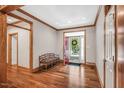 Foyer with hardwood flooring and a red entrance door at 289 Stoneview, Pittsboro, NC 27312