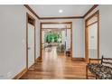 Hallway with hardwood flooring leading into living area at 289 Stoneview, Pittsboro, NC 27312