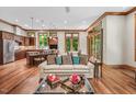 Open concept living room with a kitchen island and dining area at 289 Stoneview, Pittsboro, NC 27312