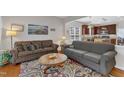 Comfortable living room featuring hardwood floors and natural light at 3400 Secretariat Way, Raleigh, NC 27614
