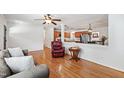 Open concept living area with hardwood floors and seamless transition to the kitchen at 4906 Lakemont Dr, Raleigh, NC 27609